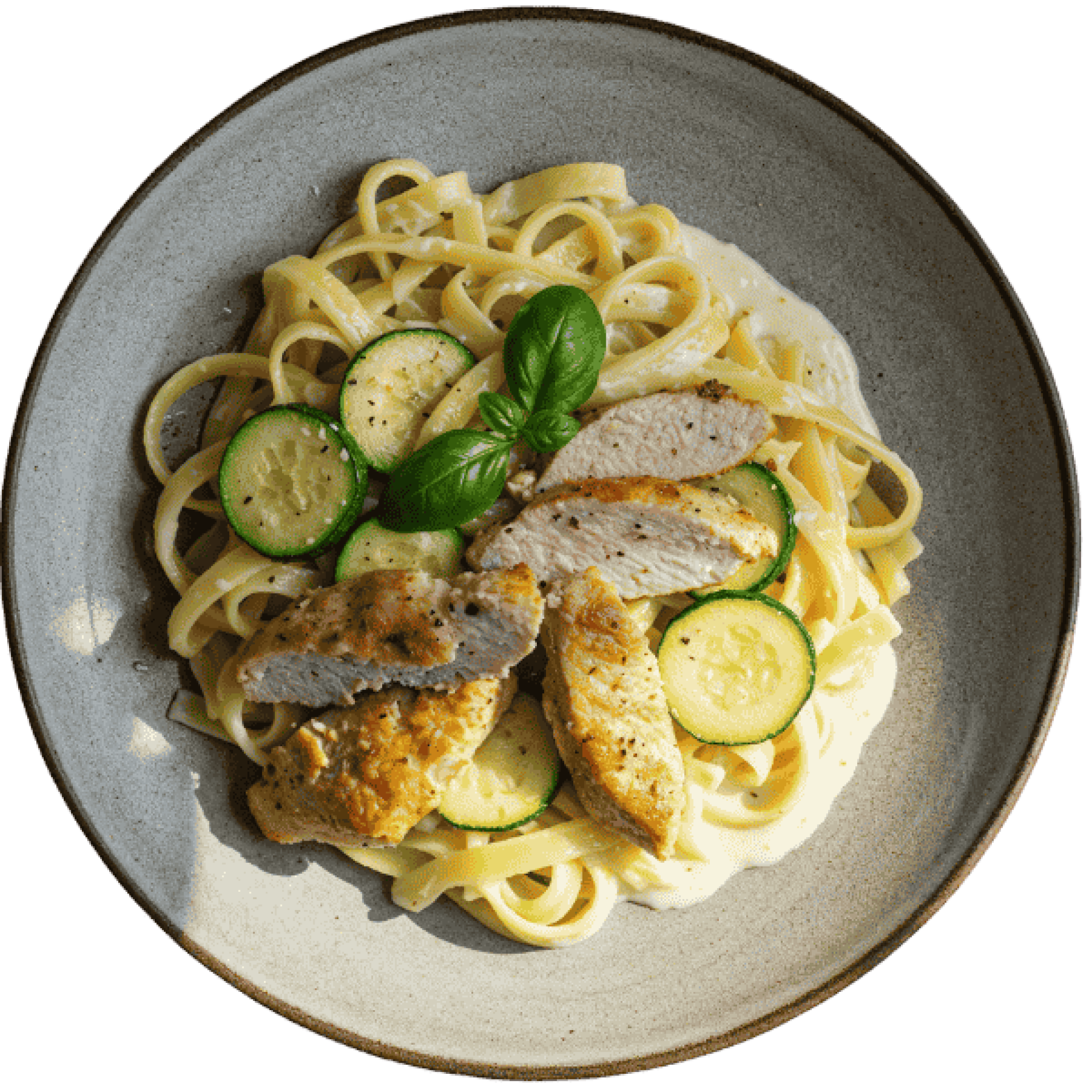 Turkey Fillet Pieces with Zucchini and Tagliatelle in a Creamy White Sauce