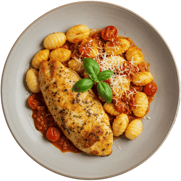 Baked chicken with gnocchi in tomato and parmesan sauce