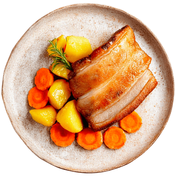 Roasted belly pork meat with potatoes and carrot