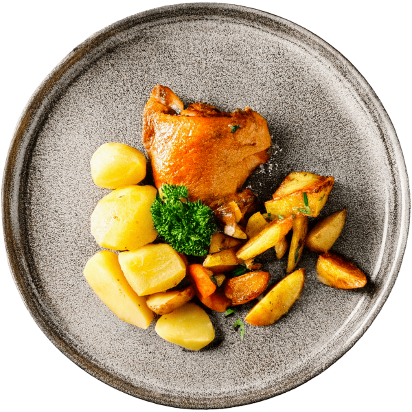Roasted chicken thigh with vegetables and potatoes